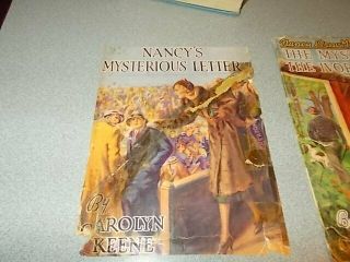 7 Vintage Nancy Drew books,  1930s editions,  blue covers w/ orange silhouette 6