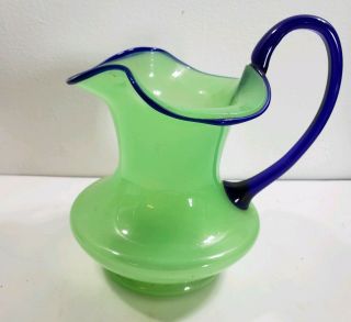 Vintage Czech Green 6 1/2 " Art Glass Pitcher With Blue Handle And Blue Rim