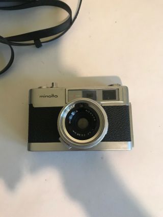 Minolta Al - F Camera With Rokkor Lens 1:2.  7 F=38mm