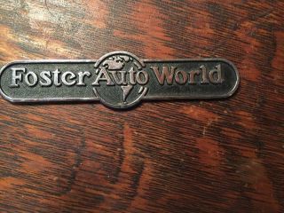 Vintage Foster Auto World,  Memphis Tn Auto Dealer Trunk Emblem.  Jh04