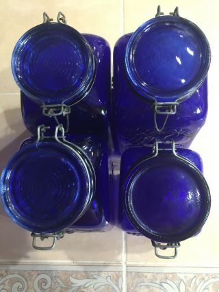 Set of (4) Vintage COBALT BLUE Glass Canisters Fruit Embossed Wire Bale Lids 8
