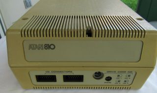 Atari 810 disk drive with some case damage - - - - 3