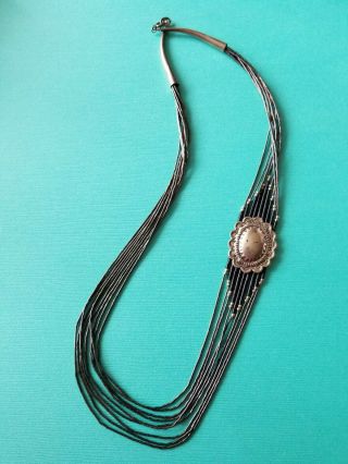 Vintage Liquid Sterling Silver 9 Strand Conch Necklace