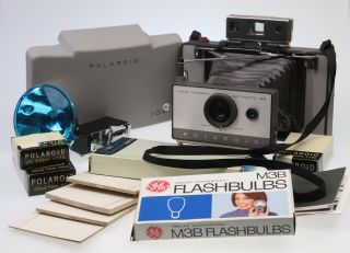 Polaroid 103 Land Camera & 268 Flash W/ Manuals,  Case,  516 & 585 Filters,  Film