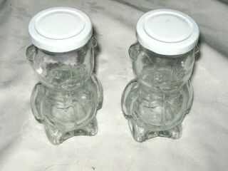 A Vintage Clear Glass Tin Screw Lid Upright Teddy Bear Spread Jars