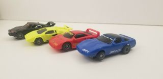4 Vintage Tyco Slot Car Set.  Corvette,  Lamborghini,  Ferrari,  And Porsche.