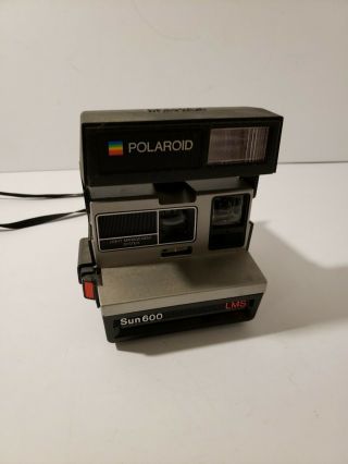 Polaroid Land Sun 600 Lms Instant Camera With Flash And 100 Euc