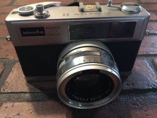 Minolta Hi Matic 11 3 Circuit Film Camera W/45mm 1:1.  7 Lens & Case