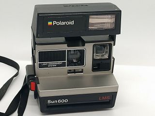 Vintage Polaroid Sun 600 Lms Instant Camera W/ Flash & Strap.
