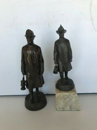 Two Vintage Fireman Statues,  High Eagle Helmets & Lanterns