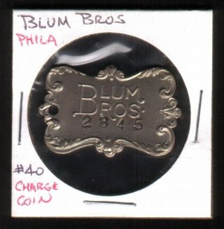Blum Bros Vintage Metal Charge Coin