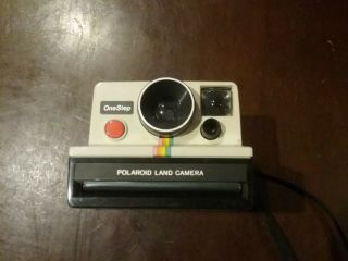 Polaroid One Step Land Camera With Rainbow Stripe.