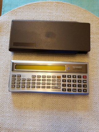 Sharp Pc - 1211 Pocket Computer With Case.  Mint