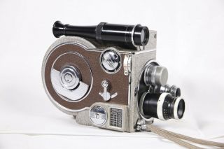Revere 8 Model Sixty Cartridge 8mm Movie Camera With 3 Lenses,  Film,  And Case