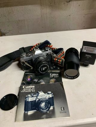 Cannon Ae1 35mm Camera With Lenses And Flash Bundle