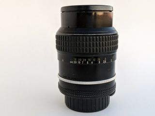 Vintage Nikon Nikkor Camera Lens w/ Caps 105mm 1:2.  5 800724 3