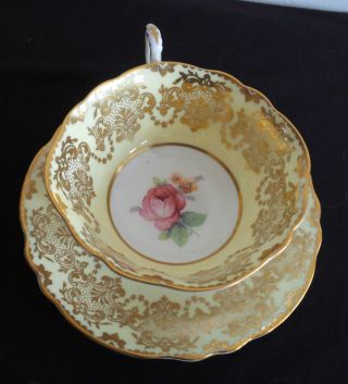 VINTAGE PARAGON TEA CUP AND SAUCER PALE YELLOW AND GOLD A1147/2 8 2