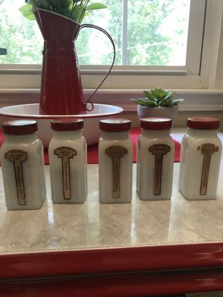 Set of 9 Vintage Art Deco Griffith’s milk glass spice jars with Red Metal Lids 2