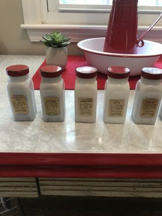 Set of 9 Vintage Art Deco Griffith’s milk glass spice jars with Red Metal Lids 4