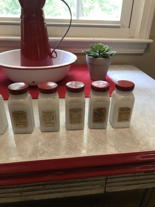 Set of 9 Vintage Art Deco Griffith’s milk glass spice jars with Red Metal Lids 5