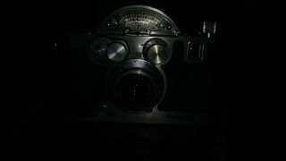 Mercury II Model CX 1/2 Frame 35MM Camera with Tricor 35mm f 2.  7 Lens 4