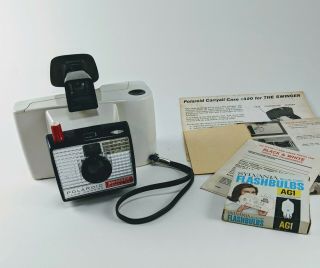 Vintage Polaroid Land Camera Swinger Model 20 w/ Flash Bulbs case and documents 2