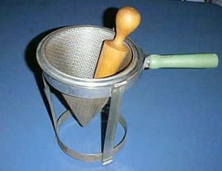Vntg Metal Cone Strainer /saucer /ricer,  Wood Pestle,  Stand W/ Green Wood Handle