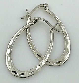 Vintage.  925 Sterling Silver,  Diamond Cut Flat Oval Hoop Earrings,  Lever Backs