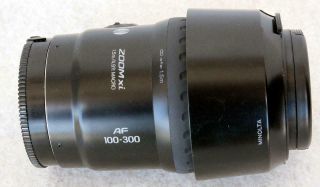 Minolta Maxxum Zoom Xi 100 - 300mm,  F/4.  5 Lens -,