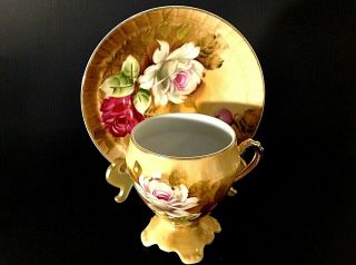 VINTAGE PEDESTAL CUP & SAUCER.  HAND PAINTED.  RED & WHITE ROSES.  GOLD ACCENTS 3