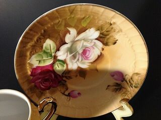 VINTAGE PEDESTAL CUP & SAUCER.  HAND PAINTED.  RED & WHITE ROSES.  GOLD ACCENTS 5