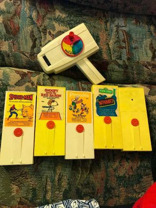 Vintage Fisher Price Movie Viewer With 5 Cartridges: Snoopy,  Mickey,  Superman