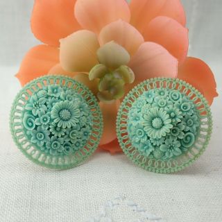 Vintage 1 3/4 " Round Turquoise Celluloid Heavily Carved Flower Clip Earrings
