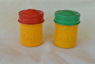 2 Vintage 35mm Yellow Metal Kodak Film Canisters W Green & Reddish Brown Lids