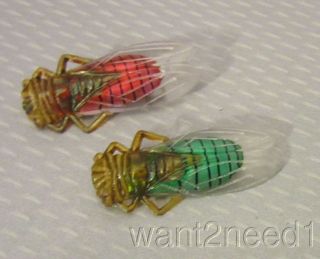 2 Vtg Lucky French Red & Green Celluloid Cicada Pins Clear Root Beer Foil Backs