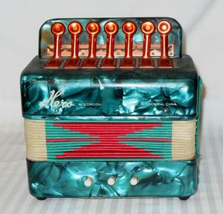 Vintage Small Toy Hero Accordion For Children Red And Green Plays Great