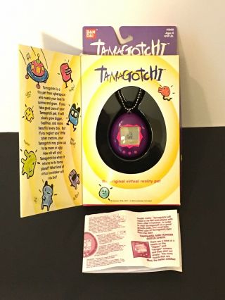 Bandai Tamagotchi Virtual Pet Vintage Purple Pink 1996 W/ Box