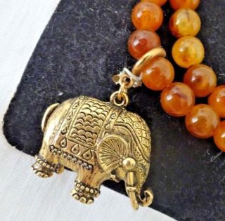 Vintage 1976 Sarah Coventry Rajah Strand Necklace Removable Elephant Faux Amber