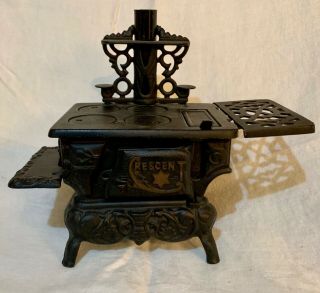 VINTAGE CRESCENT CAST IRON MINI TOY STOVE WITH ACCESSORIES 3