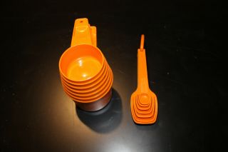 Vintage Tupperware Measuring Cups and Measuring Spoons in orange 2