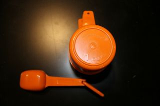 Vintage Tupperware Measuring Cups and Measuring Spoons in orange 3