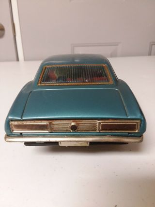 Camaro Battery Bump N Go Vintage toy tin car 4