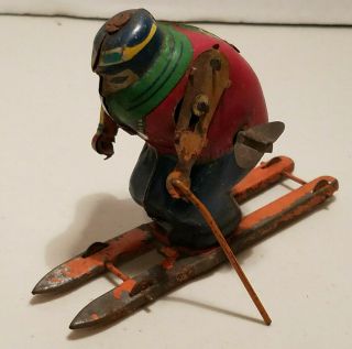 Vintage Occupied Japan Wind Up Tin Litho Skier