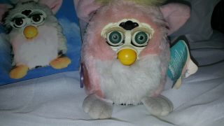 1999 Vintage Furby Babies with a Trainer ' s guide. 2