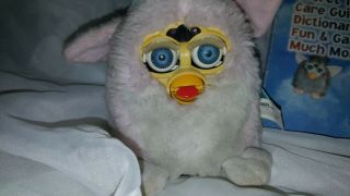 1999 Vintage Furby Babies with a Trainer ' s guide. 3