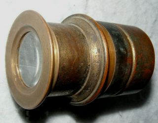 An Old,  Unbranded,  Small Brass Lens With Rack And Pinion Focusing