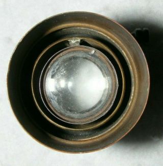 An old,  unbranded,  small brass lens with rack and pinion focusing 3