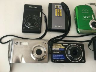 9 Digital Cameras.  Sony,  FujiFilm,  Samsung,  Hp,  and Panasonic. 3