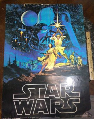 Vintage 1977 Star Wars Poster With Some Damage.  It 