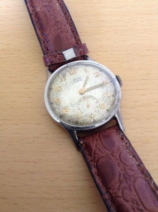 Vintage Avia Gents 15 Jewel Wristwatch In Full Order.  Ornate Face.